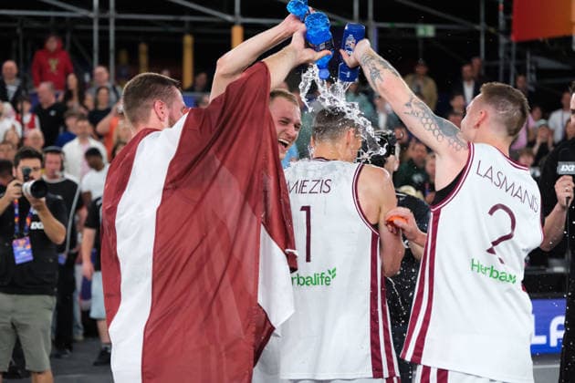 June 7, 2026, Warsaw, Masovian Voivodeship, Poland: Latvia s FRANCIS LACIS (6), KARLIS LASMANIS (2), and ZIGMARS RAIMO (9) pour water on NAURIS MIEZIS (1) as they celebrate victory at the end of the FIBA 3x3 Basketball World Cup men s final game between Latvia and Germany in Warsaw, Poland. Latvia defeated Germany to become world champions. Warsaw Poland - ZUMAk204 20260607_zip_k204_061 Copyright: xRomanxKozielx