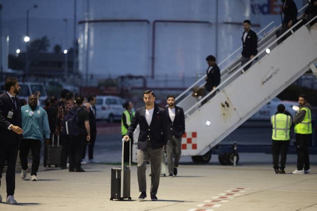 (260608) -- TIJUANA, June 8, 2026 -- Captain of the Iranian national football team Ehsan Hajisafi (front) arrives at Tijuana International Airport in Tijuana, Mexico, June 7, 2026. (Photo by Xinhua) (SP)MEXICO-TIJUANA-FOOTBALL FIFA World Cup, WM, Weltmeisterschaft, Fussball TEAM IRAN JoebethxTerriquez 