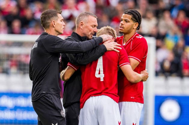 Denmark v Ukraine, football friendly, Odense, Denmark Odense, Denmark. 07th, June 2026. Lucas Hogsberg (4) of Denmark seen in shock after the collapse of Christian Eriksen and is supported by William Osula (R) and assistant coach Daniel Agger (L) at the football friendly between Denmark and Ukraine at Odense Stadion in Odense. Denmark, Odense, Nature Energy Park  Copyright: xGonzalesxPhoto KentxRasmussenx
