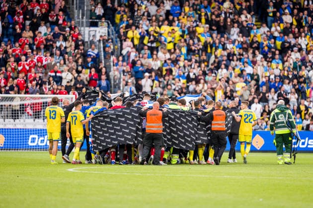 Denmark v Ukraine, football friendly, Odense, Denmark Odense, Denmark. 07th, June 2026. The players of Denmark and Ukraine cover for Christian Eriksen who receives help after his collapse at the football friendly between Denmark and Ukraine at Odense Stadion in Odense. Denmark, Odense, Nature Energy Park  Copyright: xGonzalesxPhoto KentxRasmussenx