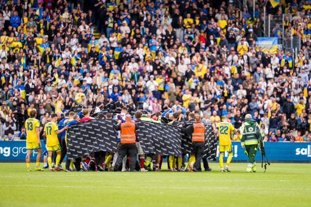 Denmark v Ukraine, football friendly, Odense, Denmark Odense, Denmark. 07th, June 2026. The players of Denmark and Ukraine cover for Christian Eriksen who receives help after his collapse at the football friendly between Denmark and Ukraine at Odense Stadion in Odense. Denmark, Odense, Nature Energy Park  Copyright: xGonzalesxPhoto KentxRasmussenx