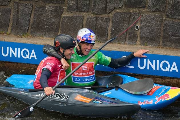 World Cup in water slalom in Prague - Troja on June 7, 2026. The picture shows kayak cross winner Jakub Krejci and silver medalist Vit Prindis. (CTKxPhoto PetrxMalina) CTKPhotoF202606070026501  CTKPhotoF202606070026501