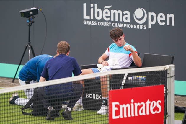 2026-06-08 - Libema Open 2026 ROSMALEN, NETHERLANDS - JUNE 8: Mees Rottgering of The Netherlands with fysiotherapists on the court during the Libema Open 2026 at the Autotron on June 8, 2026 in Rosmalen, Netherlands Rosmalen Autotron Netherlands Content not available for redistribution in The Netherlands directly or indirectly through any third parties. Copyright: xAndrexWeeningx