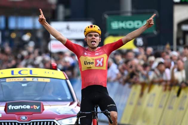 Tour Auvergne - Rhone-Alpes 2026 Stage 2 LE PUY-EN-VELAY, FRANCE - JUNE 08 : Charmig Anthon (DEN) of Uno-X Mobility wins during stage 2 of the 78th edition of Tour Auvergne - Rhone-Alpes an UCI World Tour 2.UWT cycling road race stage for Men Elite of 234.3 km with start in Saint-Martin-Le-Vinoux and finish in Le Puy-en-Velay on June 8, 2026 in Le Puy-en-Velay, France, 08 06 2026 ( Motordriver Guy De Vuyst - Le Puy-en-Velay France  Copyright: xVincentxKalutx