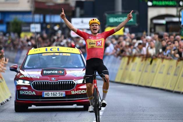 Tour Auvergne - Rhone-Alpes 2026 Stage 2 LE PUY-EN-VELAY, FRANCE - JUNE 08 : Charmig Anthon (DEN) of Uno-X Mobility wins during stage 2 of the 78th edition of Tour Auvergne - Rhone-Alpes an UCI World Tour 2.UWT cycling road race stage for Men Elite of 234.3 km with start in Saint-Martin-Le-Vinoux and finish in Le Puy-en-Velay on June 8, 2026 in Le Puy-en-Velay, France, 08 06 2026 ( Motordriver Guy De Vuyst - Le Puy-en-Velay France  Copyright: xVincentxKalutx