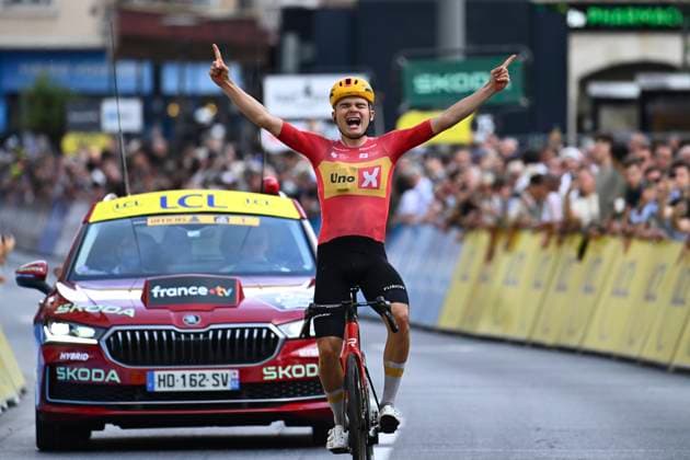 Tour Auvergne - Rhone-Alpes 2026 Stage 2 LE PUY-EN-VELAY, FRANCE - JUNE 08 : Charmig Anthon (DEN) of Uno-X Mobility wins during stage 2 of the 78th edition of Tour Auvergne - Rhone-Alpes an UCI World Tour 2.UWT cycling road race stage for Men Elite of 234.3 km with start in Saint-Martin-Le-Vinoux and finish in Le Puy-en-Velay on June 8, 2026 in Le Puy-en-Velay, France, 08 06 2026 ( Motordriver Guy De Vuyst - Le Puy-en-Velay France  Copyright: xVincentxKalutx