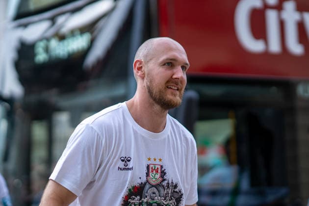 Deutschland: HBL DAIKIN Handball Bundesliga 2025 - 2026, Empfang im Rathaus und Meisterfeier des SC Magdeburg - Alter Markt (Magdeburg): Christian O Sullivan (SC Magdeburg, 24)