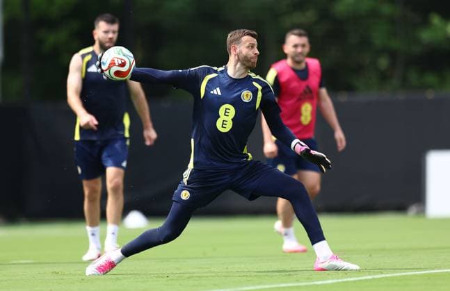 Angus Gunn of Scotland Scotland Training Session and press conference, PK, Pressekonferenz 2026 FIFA World Cup, WM, Weltmeisterschaft, Fussball Football, Atrium Health Performance Park, Charlotte, USA - 08 Jun 2026Charlotte Atrium Health Performance Park United States of America EDITORIAL USE ONLY No use with unauthorised audio, video, data, fixture lists, club league logos or live services. Online in-match use limited to 120 images, no video emulation. No use in betting, games or single club league player publications.  Copyright: xMichaelxZemanek Shutterstockx 16917216eo