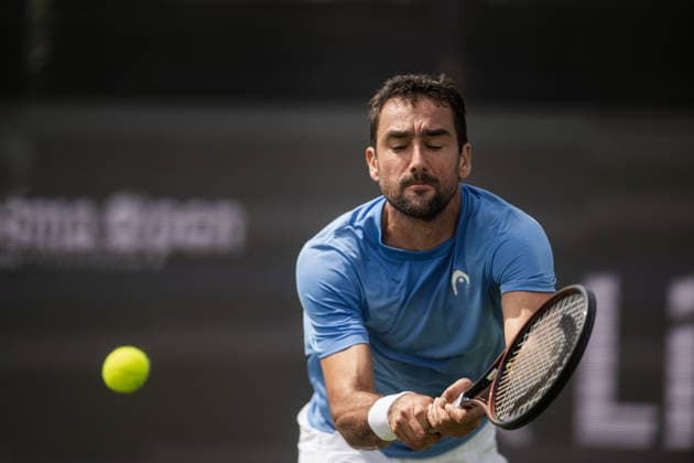 S-HERTOGENBOSCH, NETHERLANDS - JUNE 08: Marin Cilic of Croatia returns a backhand shot against Denis Shapovalov of Canada during their ATP, Tennis Herren Singles First Round match at the LibÃ ma Open on June 8, 2026 at Autotron s-Hertogenbosch in s-Hertogenbosch, Netherlands. Credit: Andy Astfalck NurPhoto Netherlands Copyright: xAndyxAstfalckx