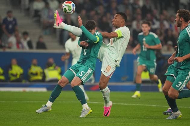 Kylian Mbappe of France and Trai Hume of Northern Ireland France v Northern Ireland, International Friendly, Länderspiel, Nationalmannschaft Football, Decathlon Arena Stade Pierre-Mauroy, Lille, France - 08 Jun 2026Lille Decathlon Arena Stade Pierre-Mau France EDITORIAL USE ONLY No use with unauthorised audio, video, data, fixture lists, club league logos or live services. Online in-match use limited to 120 images, no video emulation. No use in betting, games or single club league player publications.  Copyright: xDavexWinter Shutterstockx 16912920z