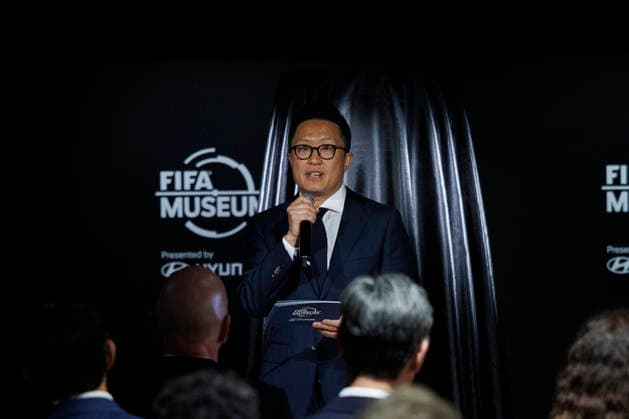 Sungwon Jee, Chief Marketing Officer of Hyundai Motor Company, speaks during the opening of the Legacies of Champions exhibition at Rockefeller Center in New York, in New York, United States, 08 June 2026. The exhibition traces every World Cup since Uruguay 1930 through original artifacts, such as historic uniforms and balls, photographs, sticker albums, and memorabilia from the tournament s most iconic teams and players. FIFA and Hyundai bring the history of the World Cup to Rockefeller Center in New York !ACHTUNG: NUR REDAKTIONELLE NUTZUNG!  Copyright: xAlfonsoxLozanox AME9870 20260608-55020539074_1