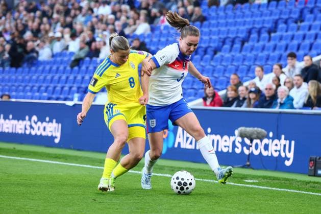 Marina Shayniuk of Ukraine and Niamh Charles of England England Women v Ukraine Women, FIFA 2027 Women s World Cup Qualifying, Football, Hill Dickinson Stadium, Liverpool, UK - 09 Jun 2026Liverpool Hill Dickinson Stadium United Kingdom EDITORIAL USE ONLY No use with unauthorised audio, video, data, fixture lists, club league logos or live services. Online in-match use limited to 120 images, no video emulation. No use in betting, games or single club league player publications.  Copyright: xPaulxCurrie Shutterstockx 16919205an