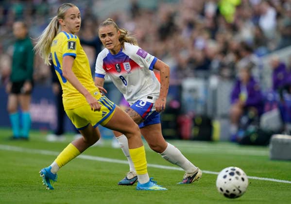 Liverpool, England, 9th June 2026. Georgia Stanway of England (R) is challenged by Yana Kotyk of Ukraine during the England Women vs Ukraine Women FIFA Women s World Cup Qualifying match at Hill Dickinson Stadium, Liverpool. Picture credit should read: Andrew Yates Sportimage EDITORIAL USE ONLY. No use with unauthorised audio, video, data, fixture lists, club league logos or live services. Online in-match use limited to 120 images, no video emulation. No use in betting, games or single club league player publications. SPI_015_AY_ENG_UKRAINE SPI-4844-0015
