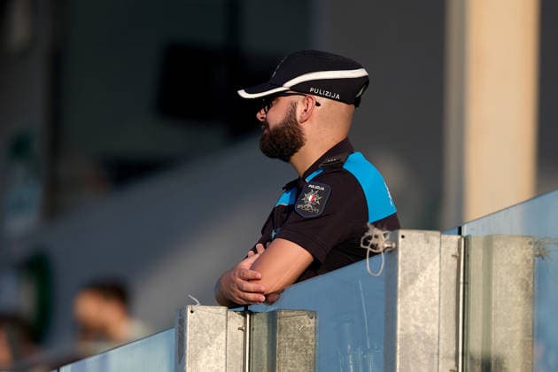 A Malta Police Force officer stand on guard during the UEFA Women™s European Qualifiers League B Group B2 soccer match between Malta and Türkiye at the Centenary Stadium in Ta™ Qali, Malta, on 09 June 2026. UEFA Women™s European Qualifiers - Malta v Turkiye