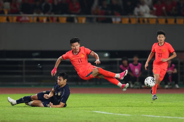 JINHUA, CHINA - JUNE 09: Lin Liangming of Team China shoots the ball during CFA Team China International Football Competition Jinhua 2026 between China and Thailand at Jinhua Sports Centre Stadium on June 9, 2026 in Jinhua, Zhejiang Province of China.  Copyright: xWuxZhizhaox 111647152944