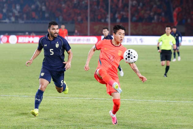 JINHUA, CHINA - JUNE 09: Wei Shihao 10 of Team China competes for the ball during CFA Team China International Football Competition Jinhua 2026 between China and Thailand at Jinhua Sports Centre Stadium on June 9, 2026 in Jinhua, Zhejiang Province of China.  Copyright: xChinaxNewsxServicex 111647192662
