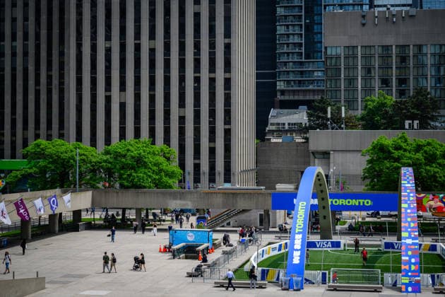 TORONTO, CANADA - JUNE 09: Banners and decorations promoting the upcoming 2026 FIFA World Cup, WM, Weltmeisterschaft, Fussball are seen at a square in downtown Toronto on June 9, 2026 in Toronto, Canada. The FIFA World Cup 2026 will kick off with an opening match in Mexico City on June 11.  Copyright: xVCGx 111647269402