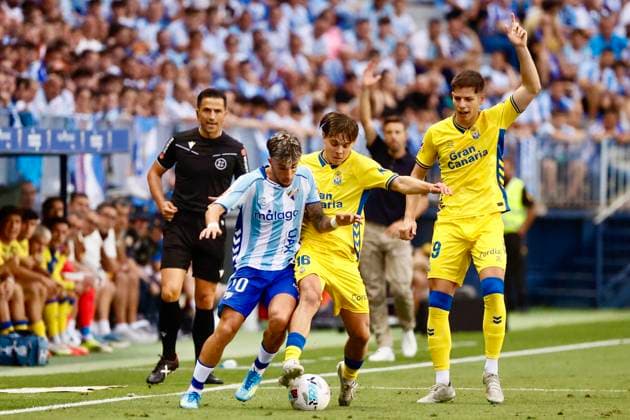 ESP: LaLiga Hypermotion playoff Malaga v UD Las Palmas Lorenzo Amatucci of Las Palmas and David Larrubia of Malaga during LaLiga Hypermotion playoff semifinal between Malaga v UD Las Palmas played at La Rosaleda Stadium in Las Malaga, on June 10, 2026 in Spain; Spain Futbol