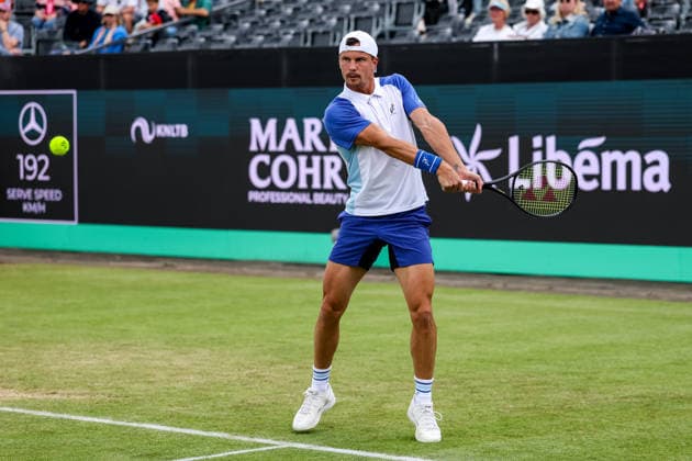 ROSMALEN, NETHERLANDS - JUNE 11: Marton Fucsovics of Hungary plays a backhand in his Men s Singles Second Round match against Felix Auger-Aliassime of Canada during Day 4 of the Libema Open Grass Court Championships at the Autotron on June 11, 2026 in Rosmalen, Netherlands.  Copyright: xRenexNijhuis MBxMediax