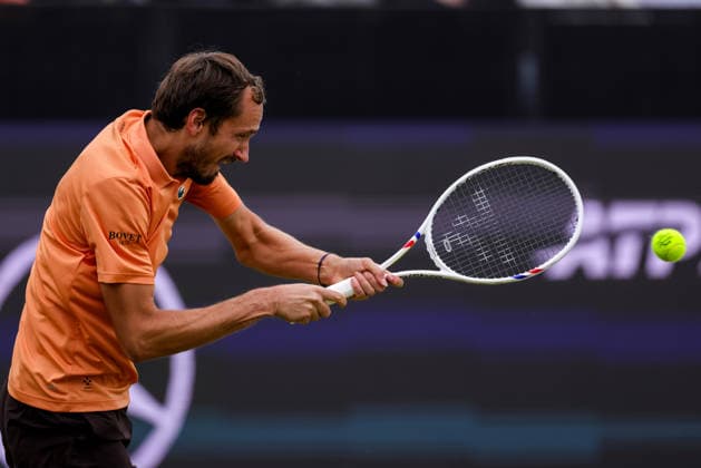 ROSMALEN, NETHERLANDS - JUNE 11: Daniil Medvedev of Russia plays a backhand in his Men s Singles Second Round match against Thijs Boogaard of the Netherlands during Day 4 of the Libema Open Grass Court Championships at the Autotron on June 11, 2026 in Rosmalen, Netherlands.  Copyright: xRenexNijhuis MBxMediax