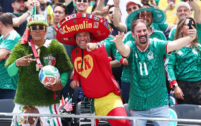 Fans of Team Mexico celebrate before the start of the FIFA World Cup, WM, Weltmeisterschaft, Fussball soccer match between Mexico and South Africa Cup at Aztec Stadium in Mexico City, Mexico, on Thursday, June 11, 2026.  MEX20260611903 CHRISTIANxBRUNSKILL