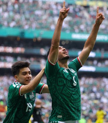 MEXICO CITY, MEXICO - JUNE 11: Raul JimÃ nez of Mexico (right) celebrates with his team-mate Gilberto Mora after scores his sides second goal during the FIFA World Cup, WM, Weltmeisterschaft, Fussball 2026 Group A match between Mexico and South Africa at Mexico City Stadium on June 11, 2026 in Mexico City, Mexico.  Copyright: xMBxMediax