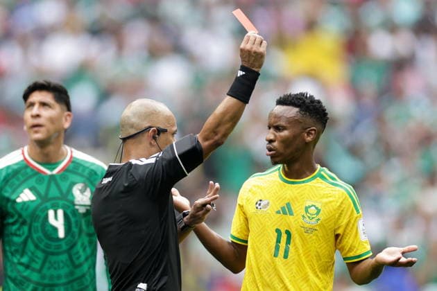 MEXICO, MEXICO CITY - JUNE 11, 2026: Referee Wilton Sampaio (L) and South Africa s Themba Zwane in the 2026 FIFA World Cup, WM, Weltmeisterschaft, Fussball Group A football match between Mexico and South Africa at Mexico City Stadium. Mikhail Sinitsyn TASS  93685943
