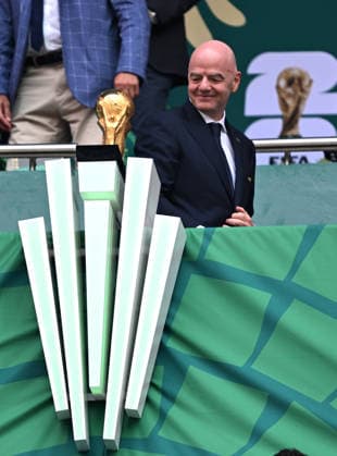(260612) -- MEXICO CITY, June 12, 2026 -- FIFA President Gianni Infantino walks past the FIFA World Cup, WM, Weltmeisterschaft, Fussball Trophy before the group A match between Mexico and South Africa at the 2026 FIFA World Cup at Mexico City Stadium in Mexico City, Mexico, June 11, 2026. ) (SP)MEXICO-MEXICO CITY-FOOTBALL-FIFA WORLD CUP-GROUP A-MEX VS RSA WuxWei 