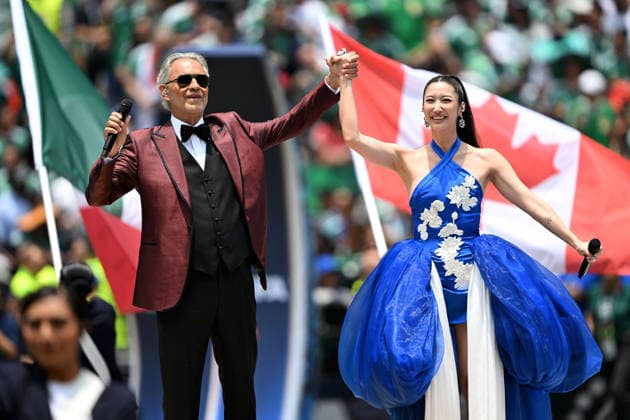 (260612) -- MEXICO CITY, June 12, 2026 -- Singers Andrea Bocelli (L) and Ejae perform before the group A match between Mexico and South Africa at the 2026 FIFA World Cup, WM, Weltmeisterschaft, Fussball at Mexico City Stadium in Mexico City, Mexico, June 11, 2026. ) (SP)MEXICO-MEXICO CITY-FOOTBALL-FIFA WORLD CUP-GROUP A-MEX VS RSA WuxWei 
