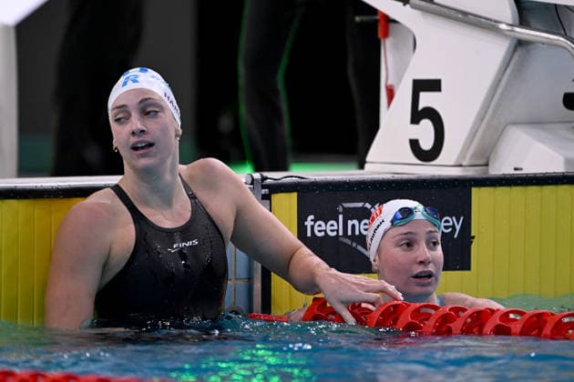 SWIMMING AUSTRALIAN TRIALS, Mollie O™Callaghan (right) with Meg Harris (left) following the Women s 100m Freestyle on day 5 of the 2026 Australian Swimming Trials at Sydney Olympic Park Aquatic Centre in Sydney, Friday, June 12, 2026. ( NO ARCHIVING, EDITORIAL USE ONLY SYDNEY NEW SOUTH WALES AUSTRALIA  Copyright: xDEANxLEWINSx 20260612124940450140