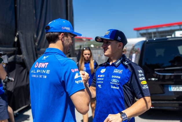 Formula 1 Barcelona Grand Prix 2026 Pierre Gasly (BWT Alpine F1 Team, 10) learns the news about his podium with Isack Hadjar (Oracle Red Bull Racing, 06) on practice day at the Barcelona GP 2026 12 06 2026