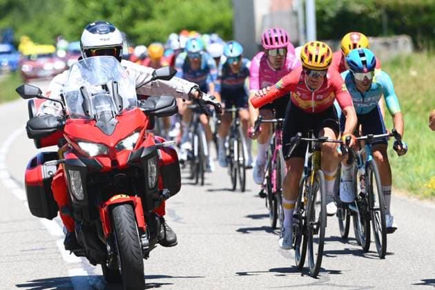 Tour Auvergne - Rhone-Alpes 2026 Stage 6 CREST-VOLAND, FRANCE - JUNE 12 : a rider of team Uno-X Mobility taking a bidon during stage 6 of the 78th edition of Tour Auvergne - Rhone-Alpes an UCI World Tour 2.UWT cycling road race stage for Men Elite of 182.3 km with start in Saint-Vulbas and finish in Crest-Voland on June 12, 2026 in Crest-Voland, France, 12 06 2026 ( Motordriver Guy De Vuyst - Crest-Voland France  Copyright: xVincentxKalutx