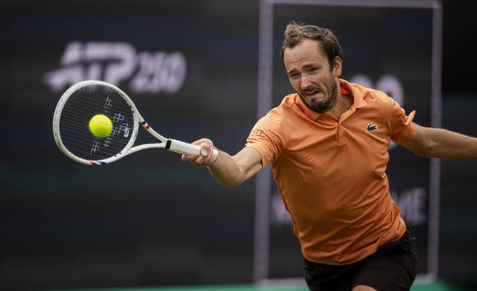 S-HERTOGENBOSCH, NETHERLANDS - JUNE 12: Daniil Medvedev plays a forehand against Thijs Boogaard of the Netherlands during their ATP, Tennis Herren Singles match at the LibÃ ma Open on June 12, 2026 at Autotron s-Hertogenbosch in s-Hertogenbosch, Netherlands. Credit: Andy Astfalck NurPhoto Netherlands Copyright: xAndyxAstfalckx