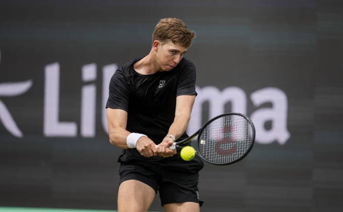 S-HERTOGENBOSCH, NETHERLANDS - JUNE 12: Thijs Boogaard of the Netherlands plays a backhand against Daniil Medvedev during their ATP, Tennis Herren Singles match at the LibÃ ma Open on June 12, 2026 at Autotron s-Hertogenbosch in s-Hertogenbosch, Netherlands. Credit: Andy Astfalck NurPhoto Netherlands Copyright: xAndyxAstfalckx