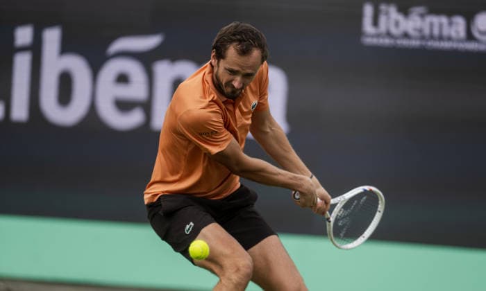 S-HERTOGENBOSCH, NETHERLANDS - JUNE 12: Daniil Medvedev plays a backhand against Thijs Boogaard of the Netherlands during their ATP, Tennis Herren Singles match at the LibÃ ma Open on June 12, 2026 at Autotron s-Hertogenbosch in s-Hertogenbosch, Netherlands. Credit: Andy Astfalck NurPhoto Netherlands Copyright: xAndyxAstfalckx