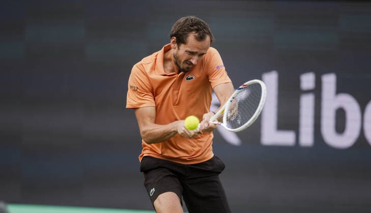 S-HERTOGENBOSCH, NETHERLANDS - JUNE 12: Daniil Medvedev plays a backhand against Thijs Boogaard of the Netherlands during their ATP, Tennis Herren Singles match at the LibÃ ma Open on June 12, 2026 at Autotron s-Hertogenbosch in s-Hertogenbosch, Netherlands. Credit: Andy Astfalck NurPhoto Netherlands Copyright: xAndyxAstfalckx