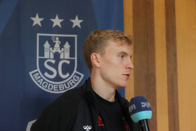 12.06.2026, xtgx, Handball, EHF Champions League, Media Day v.l. Gisli Thorgeir Kristjansson (Magdeburg, 10) Portrait, Portraet, Einzelbild Vereinslogo Vereinswappen Logo Wappen Emblem Koeln