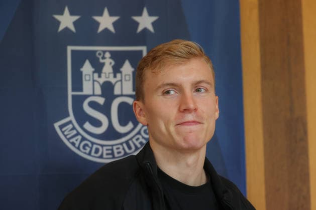 12.06.2026, xtgx, Handball, EHF Champions League, Media Day v.l. Gisli Thorgeir Kristjansson (Magdeburg, 10) Portrait, Portraet, Einzelbild Vereinslogo Vereinswappen Logo Wappen Emblem Koeln