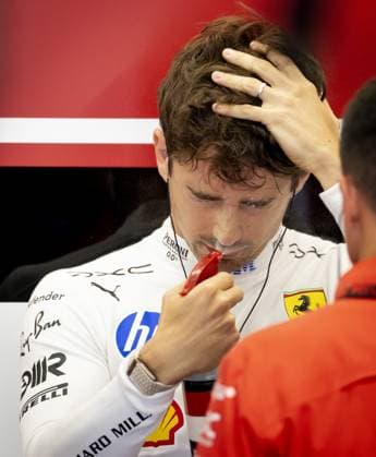 BARCELONA - Charles Leclerc (Ferrari) cools his face with a spray ahead of the first free practice session at the Circuit de Barcelona-Catalunya in the run-up to the Barcelona Grand Prix. SANDER KONING ANP xVIxANPxSportx xxANPxIVx 560820251 originalFilename: 560820251.jpg