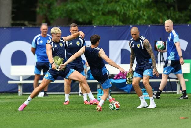 George Hirst of Scotland and Lyndon Dykes of Scotland Scotland Training Session, 2026 FIFA World Cup, WM, Weltmeisterschaft, Fussball Football, Revolution Training Centre, Foxborough, Massachusetts, USA - 12 Jun 2026Foxborough Revolution Training Centre Massachusetts (MA) United States of America EDITORIAL USE ONLY No use with unauthorised audio, video, data, fixture lists, club league logos or live services. Online in-match use limited to 120 images, no video emulation. No use in betting, games or single club league player publications.  Copyright: xMichaelxZemanek Shutterstockx 16919994am