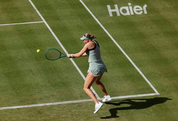 RECORD DATE NOT STATED 12th June 2026; HSBC Championships, Queens Club, West Kensington, London, England; HSBC Championships Tennis, Day Three; Amanda Anisimova (USA) plays a backhand shot against Iva Jovic (USA) HongboxChen
