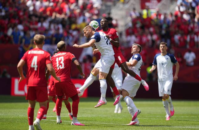 June 12 2026: Jovo Lukic (Bosnia And Herzegovina) and Ismael Kone (Canada) battle for the ball during Canada and Bosnia and Herzegovina, FIFA World Cup, WM, Weltmeisterschaft, Fussball 2026, at Toronto Stadium in Toronto, Canada. CSM Canada V Bosnia And Herzegovina: Group B - FIFA World Cup 2026  - ZUMAc04_ 20260612_zma_c04_035 Copyright: xKimxPricex