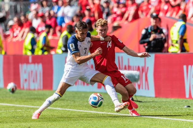 TORONTO, ON - JUNE 12: Midfielder Jacob Shaffelburg (14) of Canada and defender Amar DediÄ‡ (7) of Bosnia and Herzegovina are seen during the second half of the FIFA World Cup, WM, Weltmeisterschaft, Fussball 2026 Group B match between Canada and Bosnia and Herzegovina on June 12, 2026, at Toronto Stadium in Toronto, ON. (Photo by Mathew Tsang Icon Sportswire) SOCCER: JUN 12 FIFA World Cup 26 Group B - Canada vs Bosnia and Herzegovina EDITORIAL USE ONLY Icon260612015