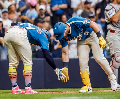 Milwaukee Brewers right fielder Jake Bauers (R) celebrates with Milwaukee Brewers catcher William Contreras (L) after hitting a three RBI home run in the fifth inning of the MLB, Baseball Herren, USA game between the Philadelphia Phillies and the Milwaukee Brewers at American Family Field in Milwaukee, Wisconsin on Friday, June 12, 2026.  MIL20260612824 TANNENxMAURY