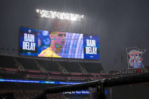June 12th, 2026: The scoreboard displays a message about a rain delay during a MLB, Baseball Herren, USA Baseball game between the St. Louis Cardinals and the Minnesota Twins at Target Field in Minneapolis, Minnesota. CSM Minneapolis USA - ZUMAc04_ 20260612_zma_c04_144 Copyright: xStevenxGarciax