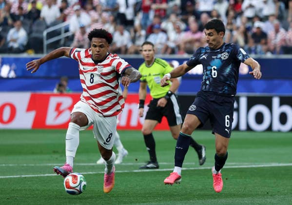 (260613) -- LOS ANGELES, June 13, 2026 -- Weston McKennie (L) of the United States vies with Junior Alonso of Paraguay during the group D match between the United States and Paraguay at the 2026 FIFA World Cup, WM, Weltmeisterschaft, Fussball at Los Angeles Stadium in Los Angeles, the United States, June 12, 2026. ) (SP)U.S.-LOS ANGELES-FOOTBALL-FIFA WORLD CUP-GROUP D-USA VS PRY MaoxSiqian 
