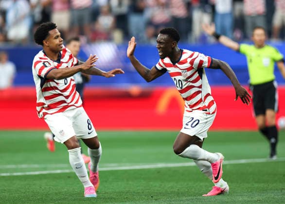 (260613) -- LOS ANGELES, June 13, 2026 -- Folarin Balogun (R) of the United States celebrates scoring during the group D match between the United States and Paraguay at the 2026 FIFA World Cup, WM, Weltmeisterschaft, Fussball at Los Angeles Stadium in Los Angeles, the United States, June 12, 2026. ) (SP)U.S.-LOS ANGELES-FOOTBALL-FIFA WORLD CUP-GROUP D-USA VS PRY MaoxSiqian 