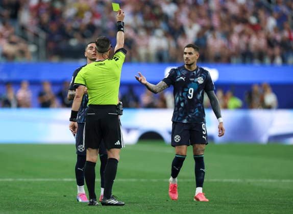 (260613) -- LOS ANGELES, June 13, 2026 -- Miguel Almiron (L) of Paraguay receives a yellow card during the group D match between the United States and Paraguay at the 2026 FIFA World Cup, WM, Weltmeisterschaft, Fussball at Los Angeles Stadium in Los Angeles, the United States, June 12, 2026. ) (SP)U.S.-LOS ANGELES-FOOTBALL-FIFA WORLD CUP-GROUP D-USA VS PRY MaoxSiqian 