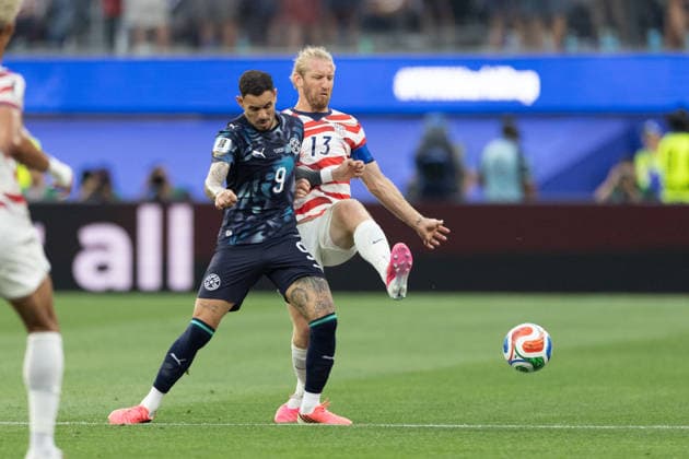 INGLEWOOD, CA - JUNE 12: Antonio Sanabria 9 of Paraguay and Tim Ream 13 of the United States compete for the ball during the FIFA World Cup, WM, Weltmeisterschaft, Fussball 2026 Group D match between USA and Paraguay on June 12, 2026 at Los Angeles Stadium in Inglewood, CA. (Photo by Karl Anderson Icon Sportswire) SOCCER: JUN 12 FIFA World Cup 26 Group D - USA vs Paraguay EDITORIAL USE ONLY Icon272260612004