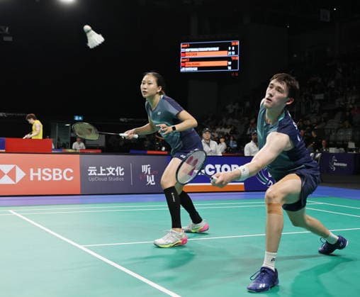 (260613) -- SYDNEY, June 13, 2026 -- Presley Smith (R) Jennie Gai comptete during the mixed doubles semifinal match between Feng Yanzhe Huang Dongping of China and Presley Smith Jennie Gai of the United States at the Australian Badminton Open 2026 in Sydney, Australia, June 13, 2026. ) (SP)AUSTRALIA-SYDNEY-BADMINTON-AUSTRALIAN OPEN-MIXED DOUBLES-SEMIFINALS GongxBing 